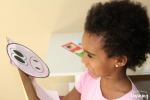 Playing with a Pig Paper Bag Puppet