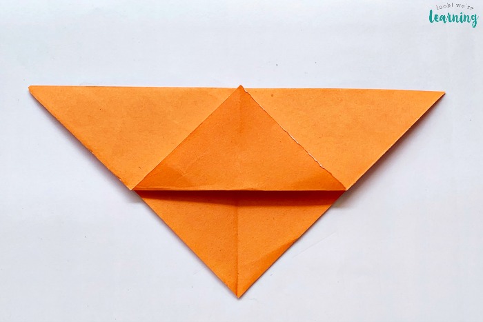 Folding an Origami Corner Bookmark